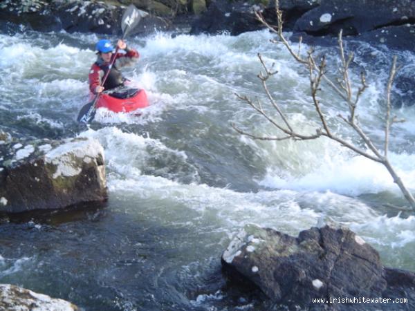 Below the bridge in low water.