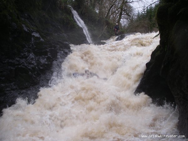 Johnny running the middle drop on the Glenarm Grade 5 , in medium to high water, In my opinion any higher than this it is unrunable due to a horizontal stopper throwing you into  the far wall where rescue is impossible, That photo was taken by roger norrris in december 2007