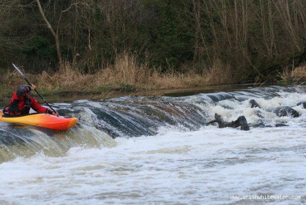 Big weir rive center left line in high water
