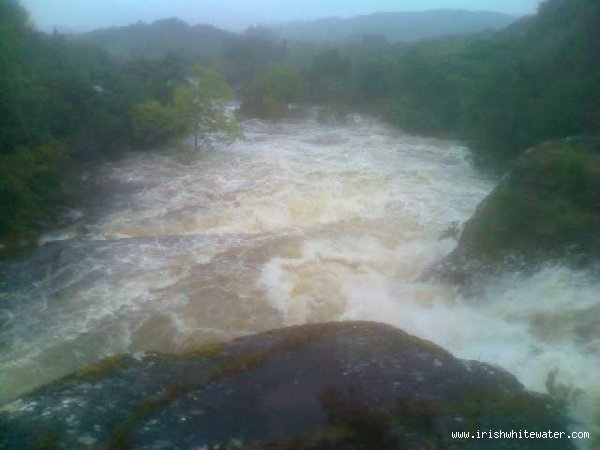 Downstream from third bridge, big drops at horizon line