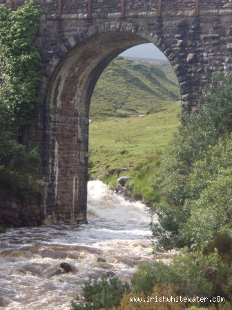 View back upstream under the bridge