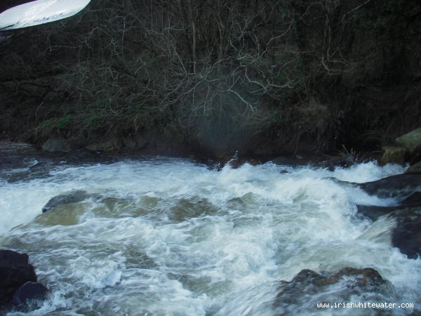 the man made weir in medium water.Shallow